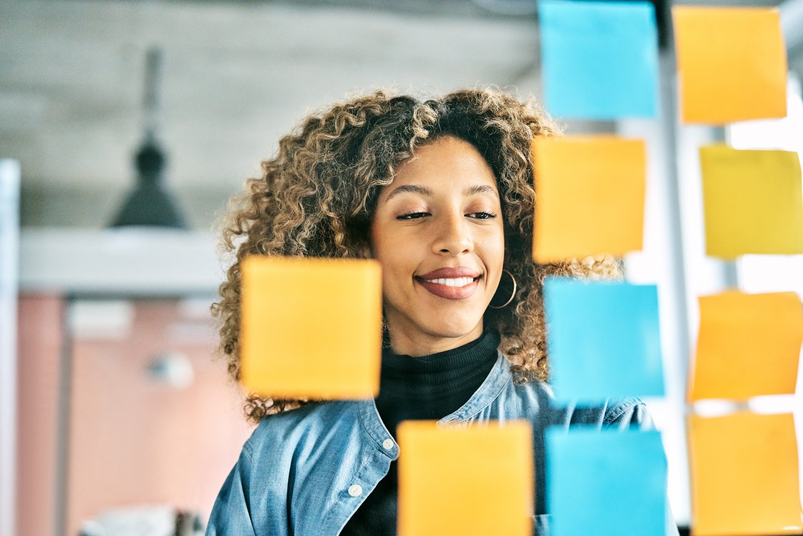 Businesswoman planning strategy in creative office